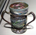 Glass Lava vase with bronze mount by Louis Comfort Tiffany at Corning Museum of Glass. Corning, NY.
