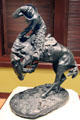 Rattlesnake bronze sculpture by Frederic Remington at Rockwell Museum of Art. Corning, NY.
