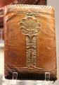 Modeled leather billfold by Elbert Hubbard III at Roycroft Campus Powerhouse. East Aurora, NY.