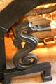 Seahorse andirons detail of living room fireplace at Elbert Hubbard Roycroft Museum. East Aurora, NY.