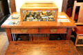 Roycroft display case on table at Elbert Hubbard Roycroft Museum. East Aurora, NY.