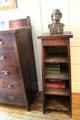 Roycroft Arts & Crafts bookshelf with Elbert Hubbard bust at Elbert Hubbard Roycroft Museum. East Aurora, NY.