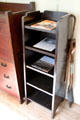 Roycroft shelf unit with shovel given to Hubbard by Luther Burbank at Elbert Hubbard Roycroft Museum. East Aurora, NY.