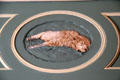 Sleeping lion medallion over doorway in library at Eastman House. Rochester, NY.