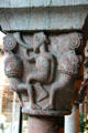 Man blowing horn between beasts carved on capital of Cuxa Cloisters at The Cloisters. New York, NY.