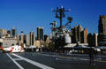 Flight deck of Intrepid against New York skyline. New York, NY.