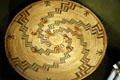 Central California native gambling basket tray & dice at National Museum of American Indian. New York, NY.