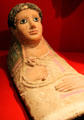 Egyptian mummy mask of youth in tunic & mantle from Tuna el Gebel at Metropolitan Museum of Art. New York, NY.