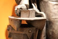 Detail of Robert Fulton sculpture by Caspar Buberl shows inventor's hand on first steamboat at Brooklyn Museum. Brooklyn, NY.