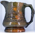 Earthenware pitcher with steamboat design by George E. Ohr of Biloxi, MS at Brooklyn Museum. Brooklyn, NY.