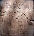 Assyrian relief of King Ashur-nasir-pal II & winged genie from King Ashur-nasir-pal II palace of Nimrud at Brooklyn Museum. Brooklyn, NY.