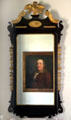 Portrait of Benjamin Franklin reflected in early American mirror at Conference House. Staten Island, NY.