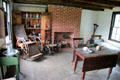 Searing Doctor's Office interior with antique wheelchairs at Old Bethpage Village. Old Bethpage, NY.