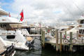 Boats moored along Long Wharf in Sag Harbor. Sag Harbor, NY.