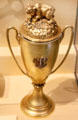 Gold cup topped by bear presented to President Roosevelt by Union League Club of California at Old Orchard Museum at Sagamore Hill NHS. Cove Neck, NY.