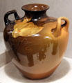 Earthenware vase with yellow flower by Amelia Browne Sprague of Rookwood Pottery Co. of Cincinnati at Cincinnati Art Museum. Cincinnati, OH.
