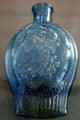 Mold blown glass flask with bust of Liberty from Kensington, PA at Toledo Glass Pavilion. Toledo, OH.