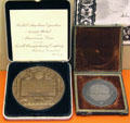 World's Columbian Exposition medal & silver medal awarded East Liverpool pottery companies at Museum of Ceramics. East Liverpool, OH.
