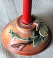 Candlestick with leaves by a Zanesville potter at Mathews House Museum. Zanesville, OH.