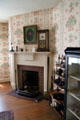 Fireplace with mantle clock at Mathews House Museum. Zanesville, OH.
