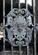 Marble House iron grill of sun god face over window. Newport, RI.