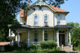House with fan bargeboard & veranda in Cathedral Historic District. Sioux Falls, SD.