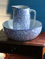 Blue & white china basin & pitcher in Yates House at Sam Houston Park. Houston, TX.