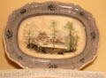 Transfer print platter over embroidered German saying at Edward Steves Homestead Museum. San Antonio, TX.