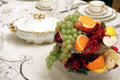 Faux fruit arrangement on dining room table at McCulloch House. Waco, TX.