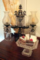 Argand lamp with cake plate at McCulloch House. Waco, TX