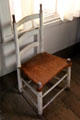 Original ladder back chair with cow hide seat at John Jay French Museum. Beaumont, TX.