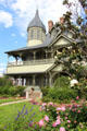 Facade & garden of W.H. Stark House. Orange, TX.