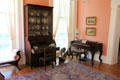 Rolltop desk & melodeon in parlor at Neill-Cochran House Museum. Austin, TX.