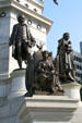 Sculpted woman symbolizing Bill of Rights before Mason & Jefferson on Washington monument at Virginia State Capitol. Richmond, VA.