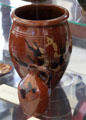Redware crock & jug from PA at Bennington Museum. Bennington, VT.