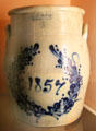 Stoneware crock painted with wreath by J&E Norton & Co. of Bennington, VT at Shelburne Museum. Shelburne, VT.