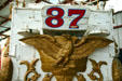 Carved golden eagle supports driver's seat on swan circus bandwagon at Circus World Museum. Baraboo, WI.
