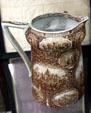 Souvenir pitcher with scenes of American exploration from World's Columbian Exposition at Columbus Museum. Columbus, WI.