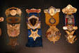 Badges from various Civil War veteran's reunions at Wisconsin Veterans Museum. Madison, WI.