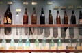 Collection of early 20thC WV-made glass bottles at West Virginia State Museum. Charleston, WV.