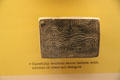 Late Adena stone tablet with animal or abstract design at Grave Creek Mound Museum. Moundsville, WV.