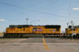 Union Pacific diesel locomotive at level crossing. Cheyenne, WY.