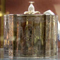 Silver engraved tea canister with welcoming pineapple on lid by Thomas Pratt & Arthur Humphreys of London at National Museum of Wales. Cardiff, Wales.