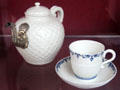 Porcelain teapot with silver gilt spout & porcelain cup & saucer by Saint-Cloud of Paris at National Museum of Wales. Cardiff, Wales.