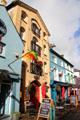 Shops & flags along Palace St. Caernarfon, Wales