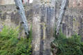 Supporting chains of Telford suspension bridge anchored in Conwy Castle towers. Conwy, Wales.