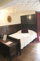 Bedroom with elaborate plaster ceiling at Plas Newydd. Llangollen, Wales.