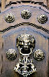 Lion door knocker on Archbishop's Palace, Lima. Peru.