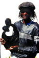 Artist poses with his modern sculpture which is typical of Harare. Zimbabwe